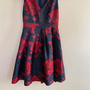 Sleeveless blue and red pleated shiny party dress